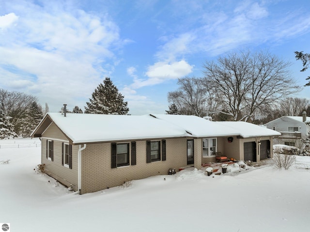 ranch-style home with a garage