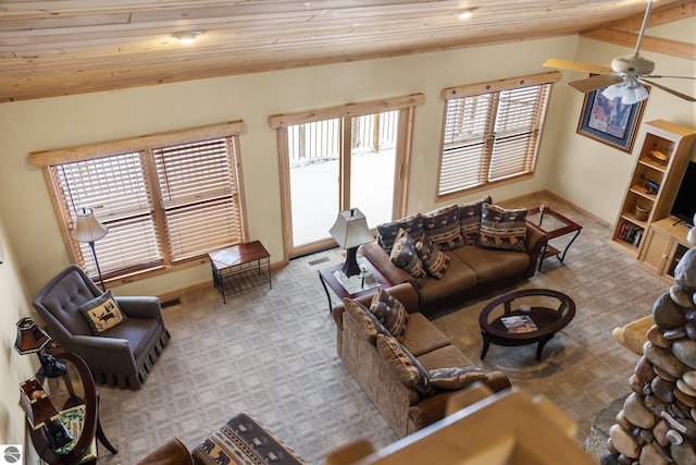 living room featuring ceiling fan, lofted ceiling, light carpet, and wood ceiling