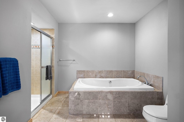 bathroom with shower with separate bathtub, tile patterned floors, and toilet