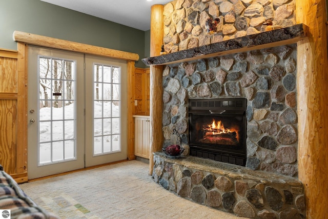 interior space with a fireplace and carpet