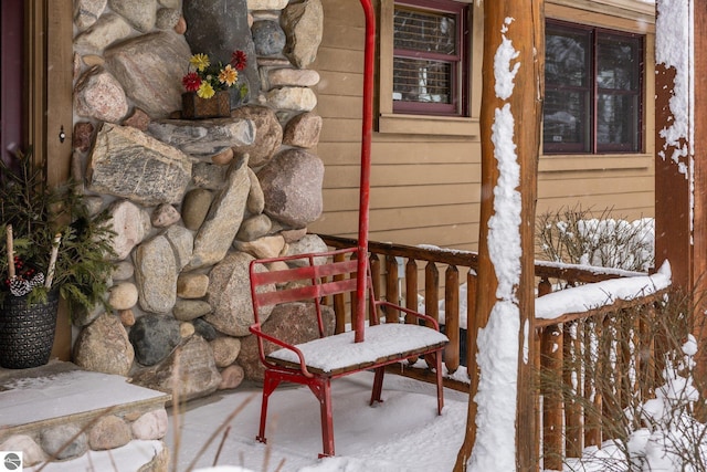 view of snow covered property entrance