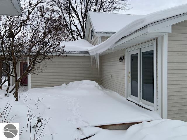 view of snow covered property