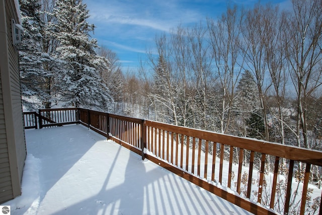 view of snow covered deck