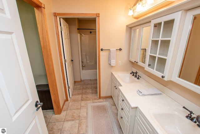 bathroom with shower / tub combination and vanity