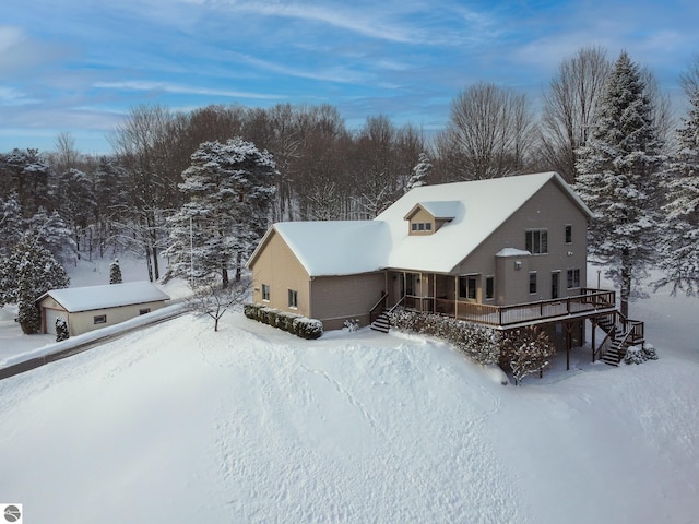 view of snow covered house