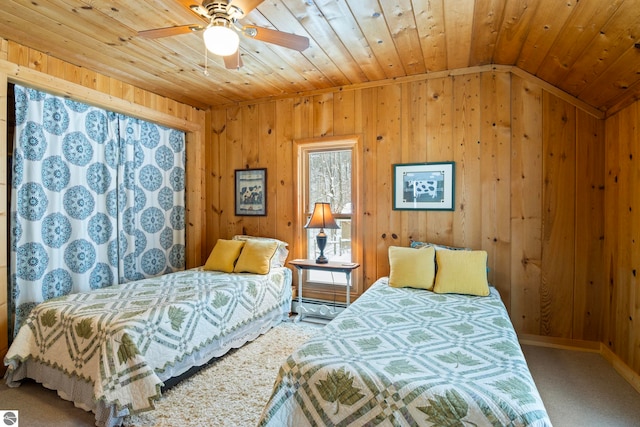 carpeted bedroom featuring lofted ceiling, wood ceiling, and wood walls