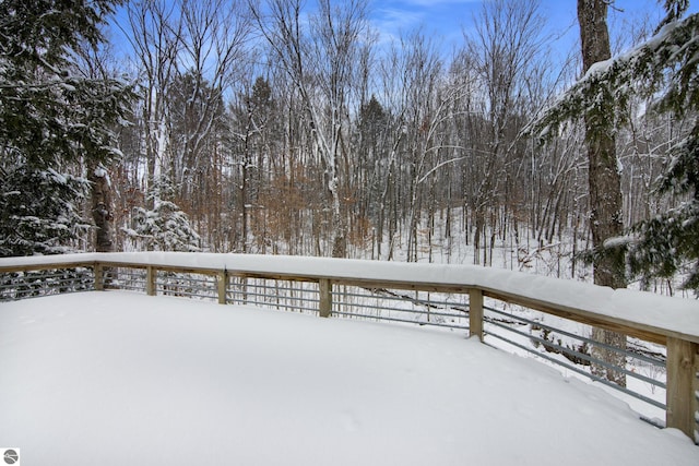 view of snow covered deck