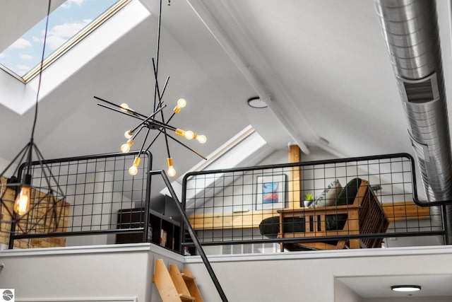 room details with beam ceiling and a skylight