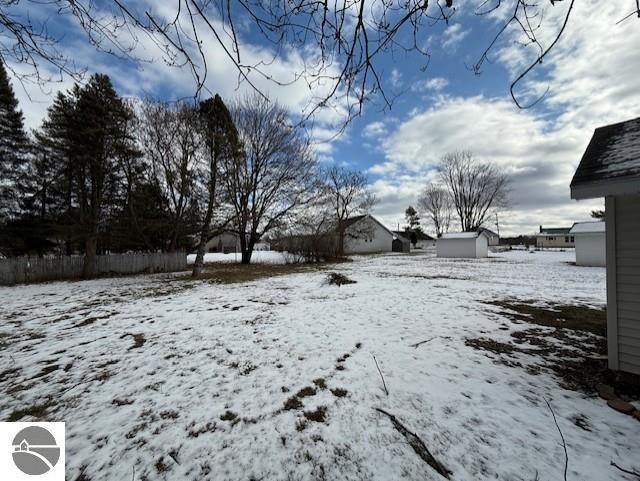 view of yard covered in snow