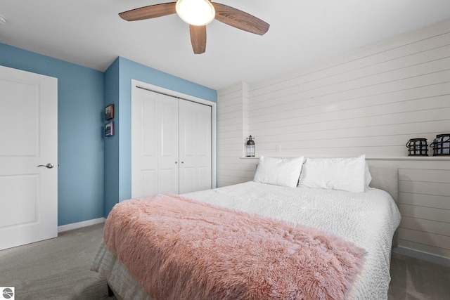 bedroom featuring a closet, ceiling fan, and carpet