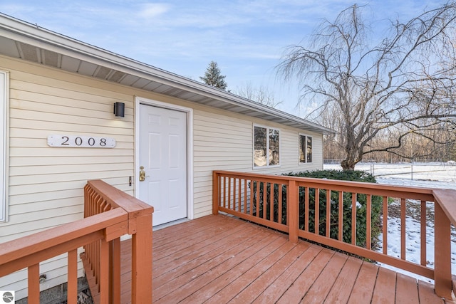 view of snow covered deck