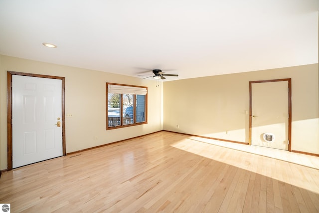 interior space featuring ceiling fan and light wood-type flooring