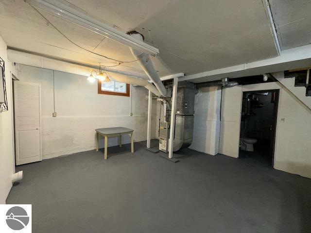 basement with heating unit