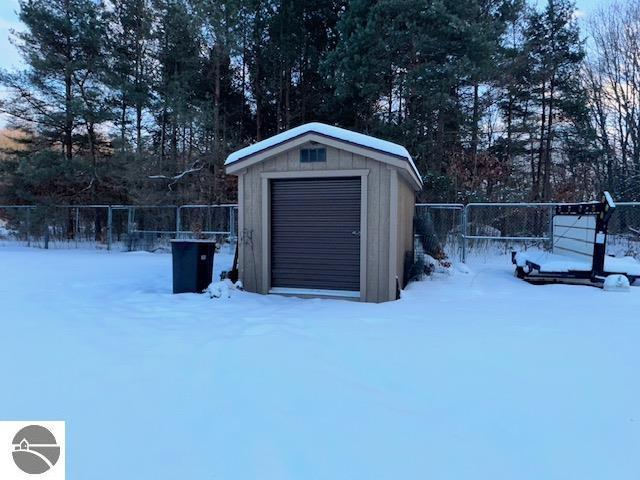 view of snow covered garage