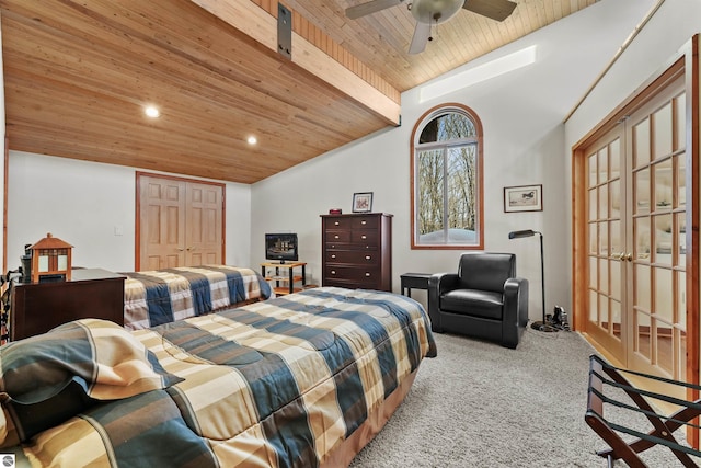 carpeted bedroom featuring vaulted ceiling, wooden ceiling, ceiling fan, and french doors