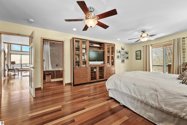 bedroom with ceiling fan, wood-type flooring, and access to exterior