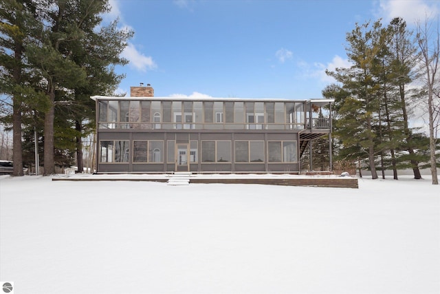 view of snow covered property