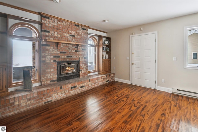 unfurnished living room featuring dark wood-type flooring, a fireplace, and baseboard heating