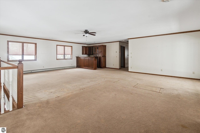 unfurnished living room with baseboard heating, light colored carpet, crown molding, and ceiling fan