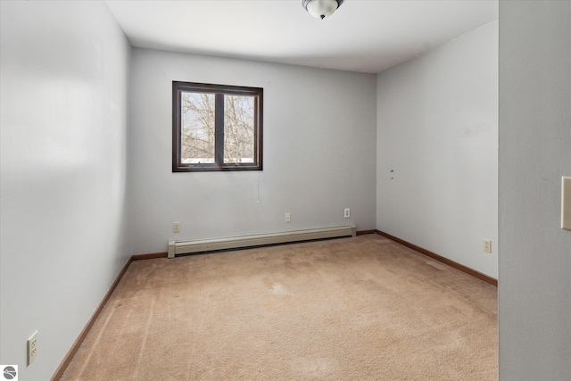 carpeted empty room with baseboard heating