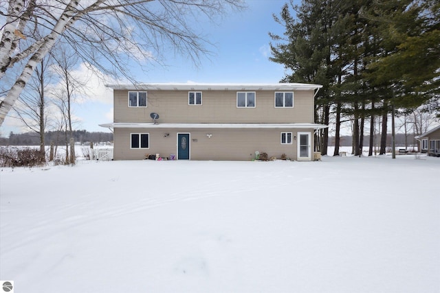 view of snow covered property