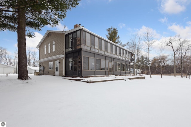 view of snow covered property