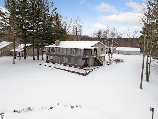 view of snow covered property