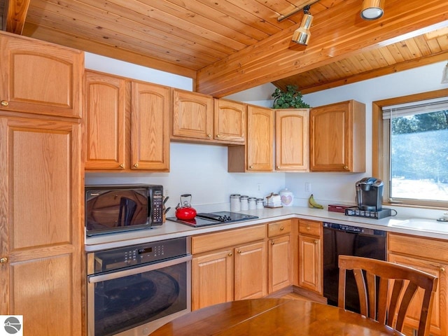 kitchen featuring sink, wooden ceiling, track lighting, beam ceiling, and black appliances