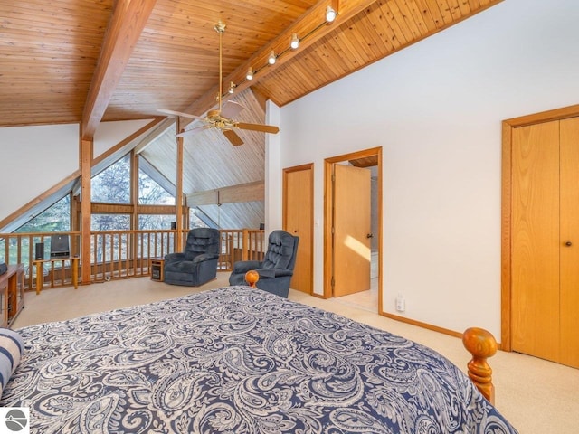 carpeted bedroom featuring beam ceiling, wood ceiling, high vaulted ceiling, and rail lighting