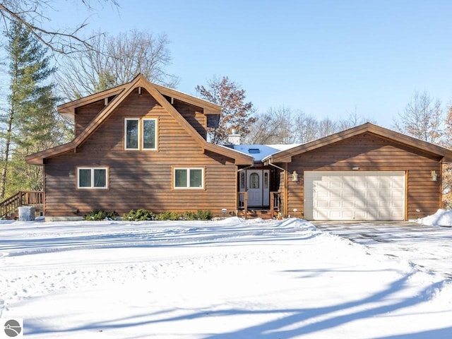 cabin featuring a garage