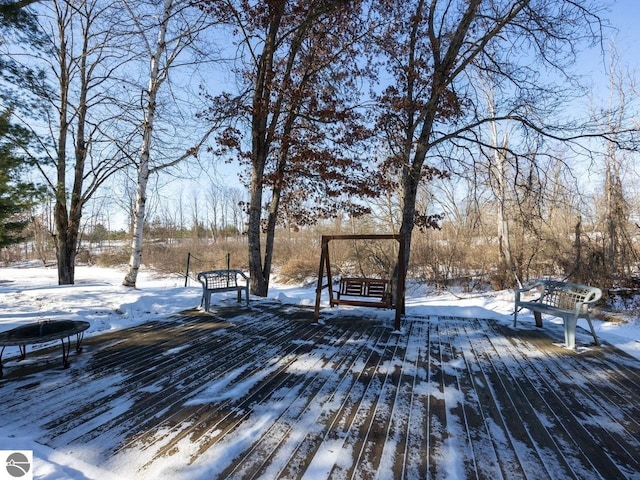 view of snow covered deck