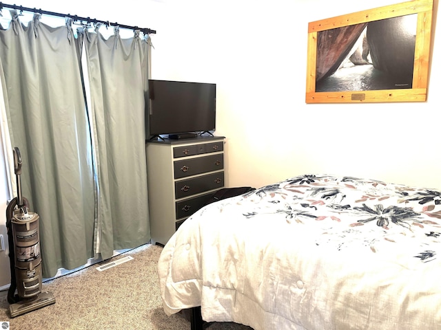 bedroom featuring carpet flooring