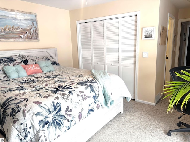 carpeted bedroom featuring a closet