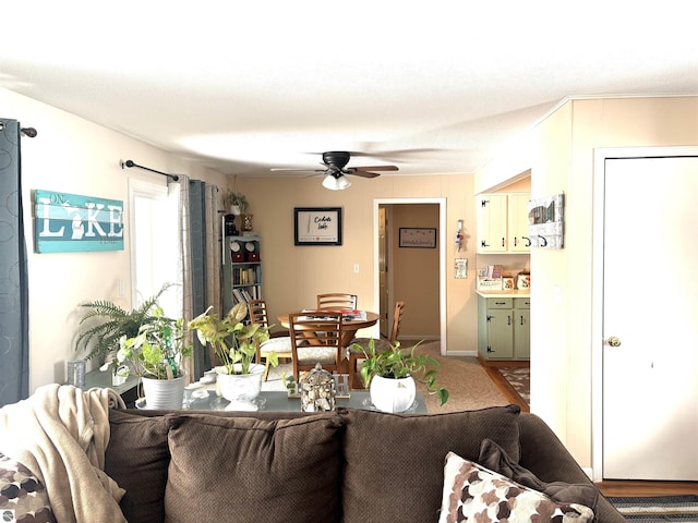 living room with ceiling fan