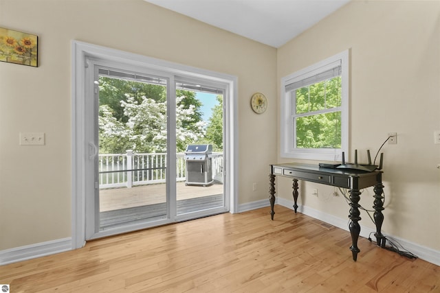 entryway with light hardwood / wood-style flooring