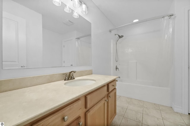 bathroom with shower / tub combo with curtain and vanity