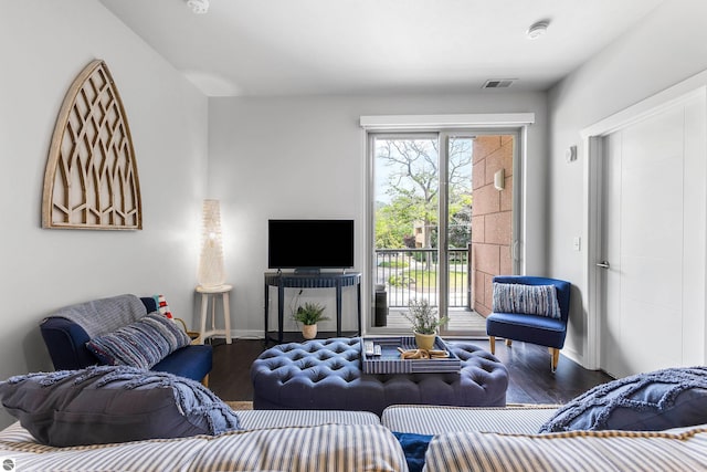 living room featuring dark hardwood / wood-style floors