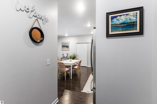 hall featuring dark wood-type flooring