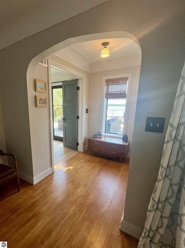 hallway featuring hardwood / wood-style floors