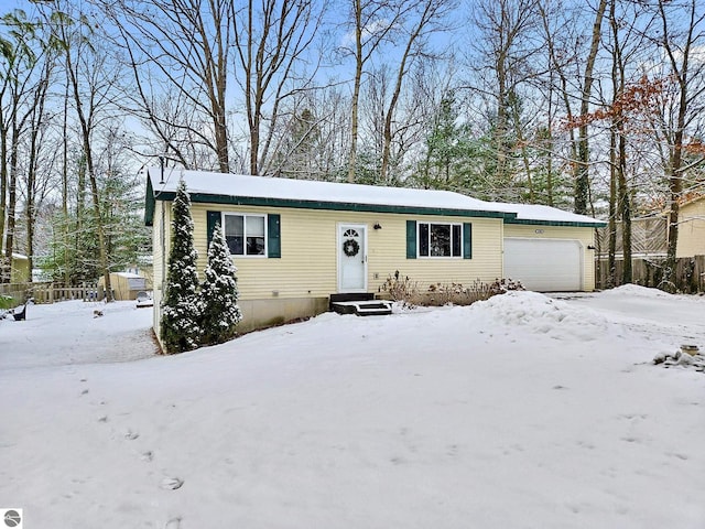 view of front of home featuring a garage