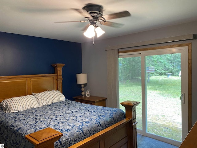 carpeted bedroom featuring ceiling fan, access to exterior, and multiple windows