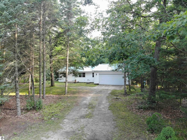 single story home featuring a garage