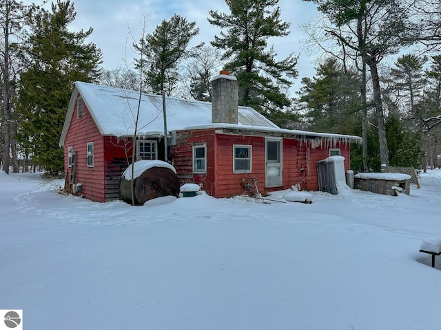 view of snow covered house