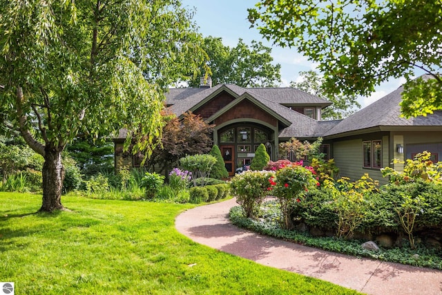 view of front of house with a front lawn