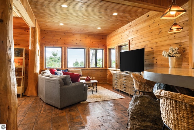 living room with dark hardwood / wood-style floors, wooden ceiling, and wood walls