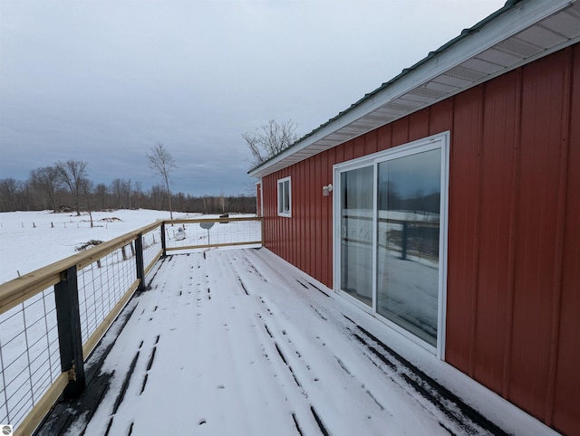 view of snow covered deck