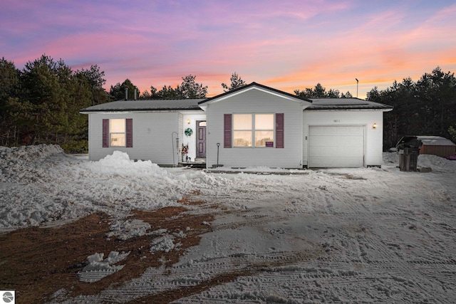 single story home with a garage