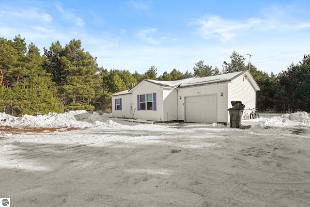 exterior space featuring a garage