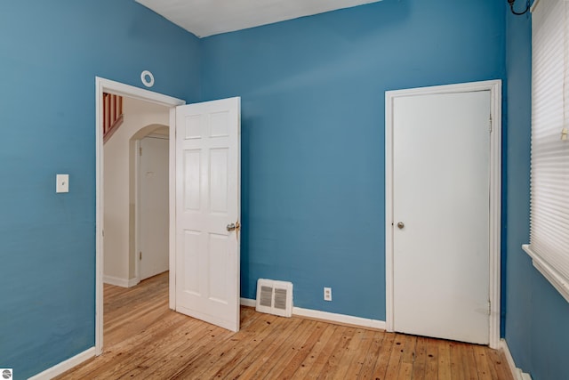 unfurnished bedroom featuring light hardwood / wood-style flooring