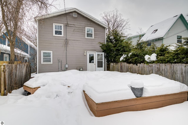 view of snow covered property